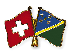 Crossed Flag Pins: Switzerland-Solomon Islands